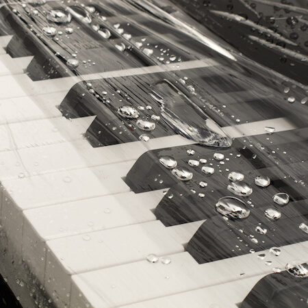 piano keys covered with rain drops poelitelenom piano keys covered with rain drops poelitelenom